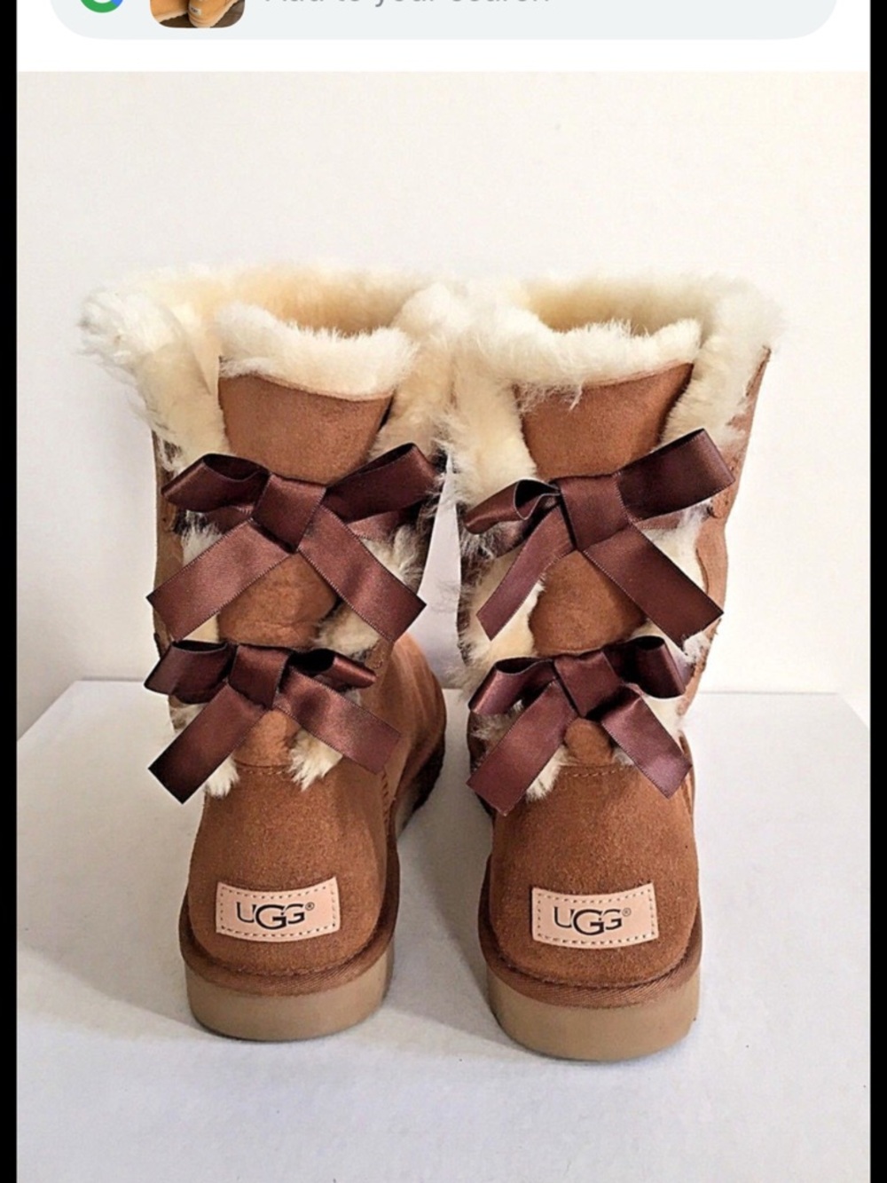 UGG Women's Chestnut Brown Shearling Bow-Back Boots, brand new.